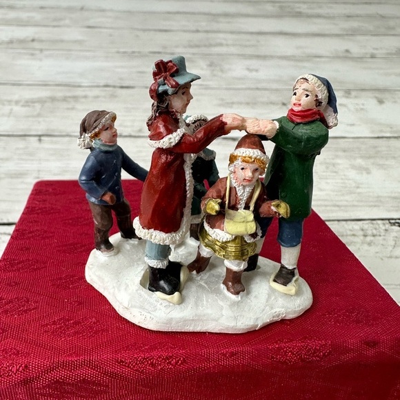 Christmas Village “Children playing London Bridge Falling Down” - Picture 1 of 4